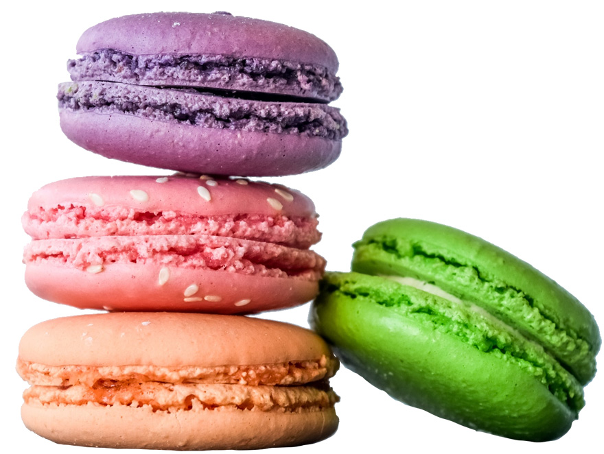 fyra stycken färglada macroner, en spröd kaka populär i Frankrike